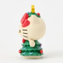Enesco Jim Shore Sanrio Hello Kitty Christmas Tree Mini Figurine, 3.7" 8 Enesco Jim Shore Sanrio Hello Kitty Christmas Tree Mini Figurine, 3.7" -Hallmark Hello Kitty in Christmas Tree Dress Mini Figurine 6017558 03